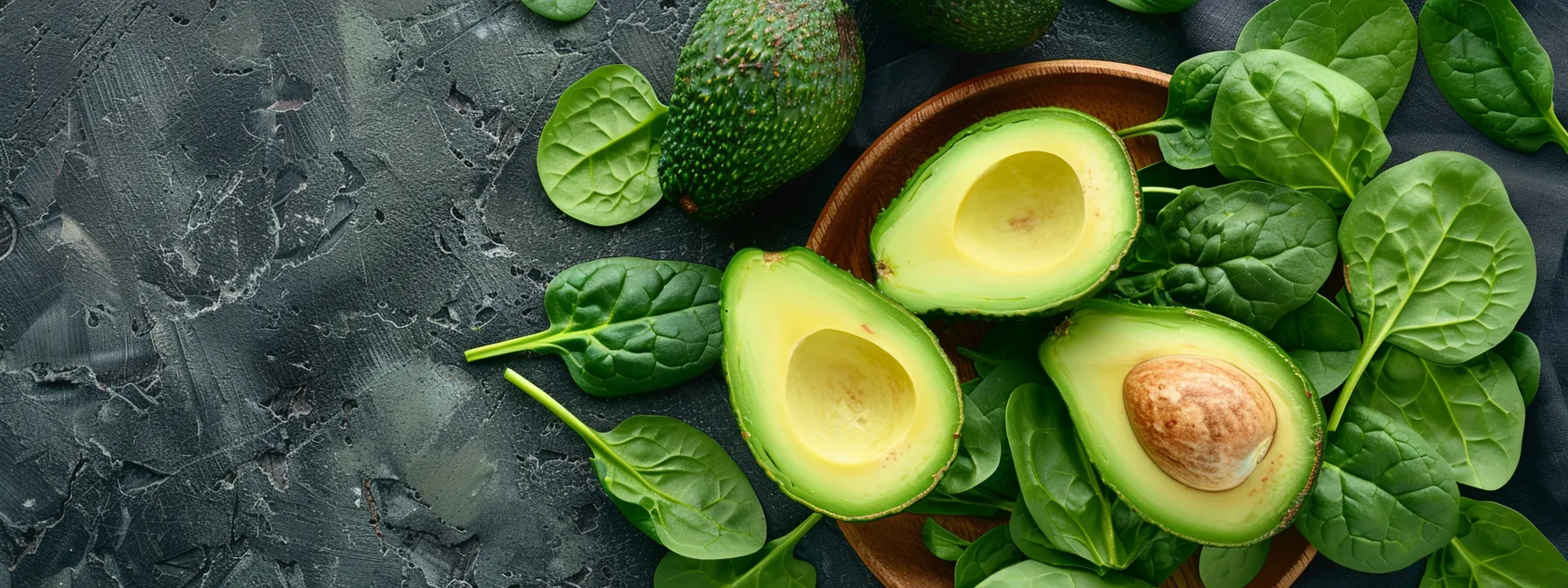 a plate filled with colorful, nutrient-dense foods like avocado, spinach, and salmon, representing the key principles of the ketogenic diet for weight loss.